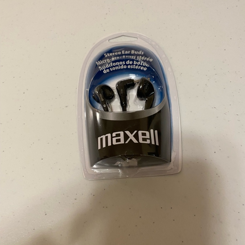FREE with purchase of $20.00 or more Maxwell Headphones